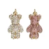 2 guldfärgade hängen charms, björnar med rosa & transparent strass, 2,5×1,3×0,5 cm