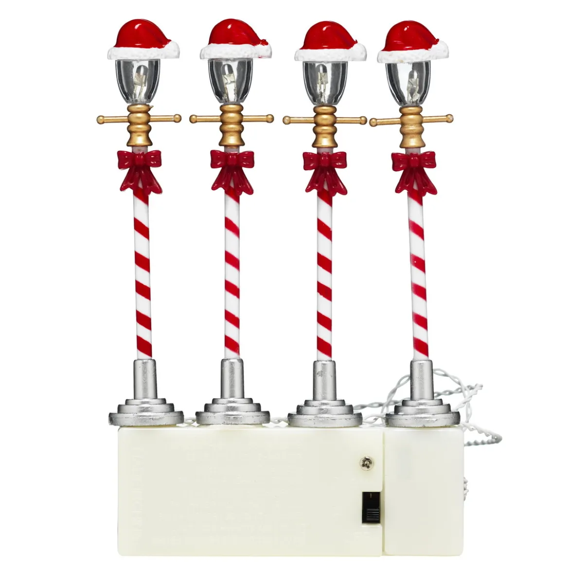 4 lyktstolpar med LED-ljus & tomteluva! 10 cm höga. Drivs av 2 AA-batterier (ingår ej)